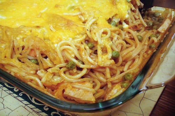 A glass casserole dish of chicken tetrazzini.
