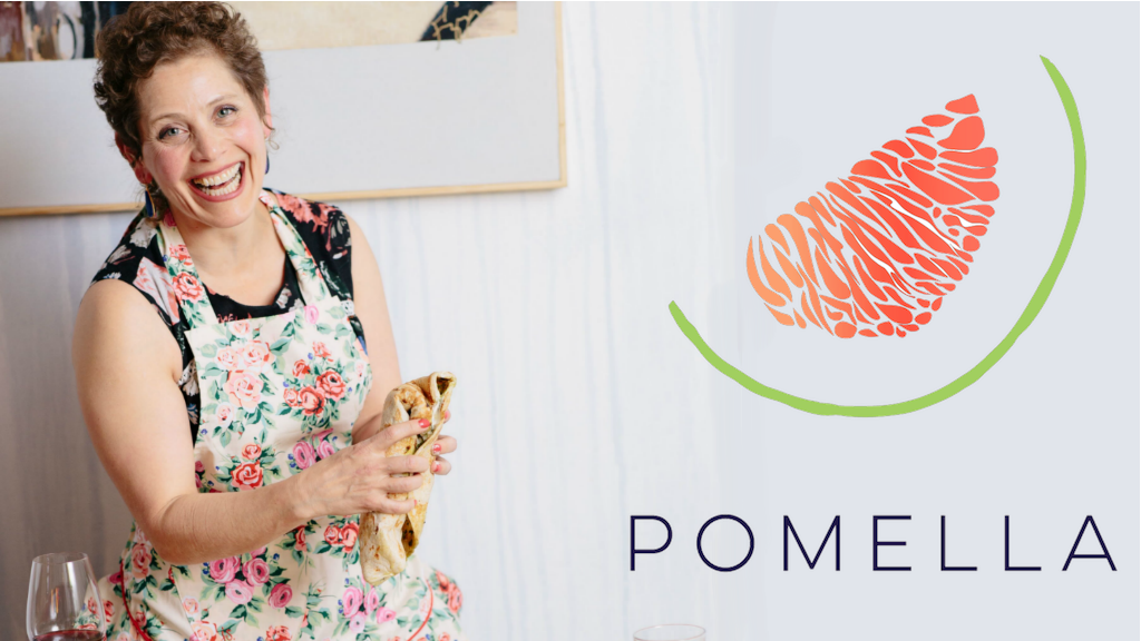 Mica Talmor smiling and holding a wrap, next to the Pomello logo.