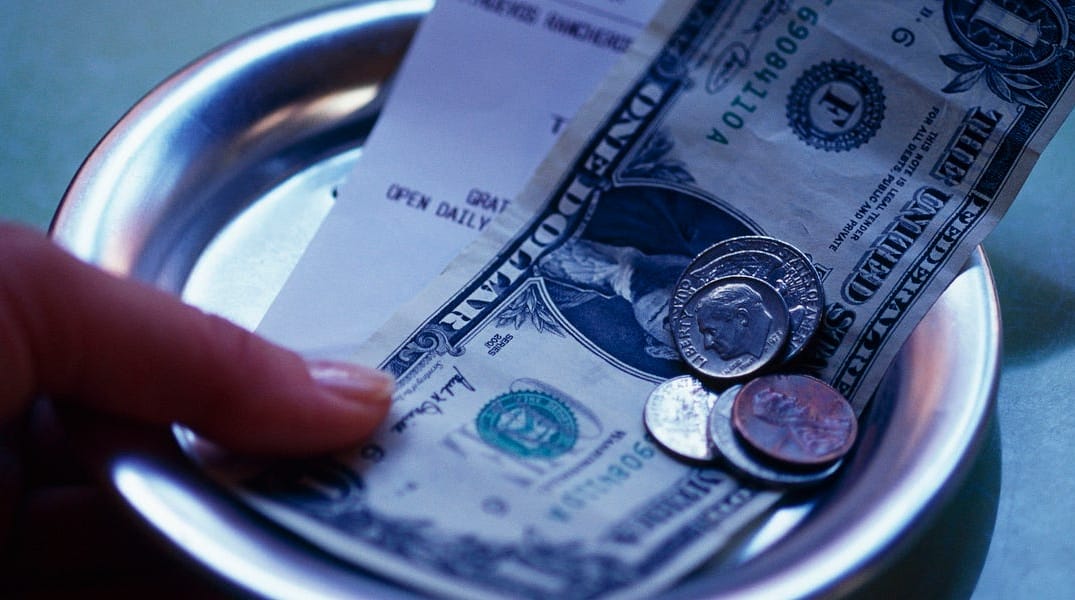 Is a Mandatory Dining Surcharge Better Than Tips?
