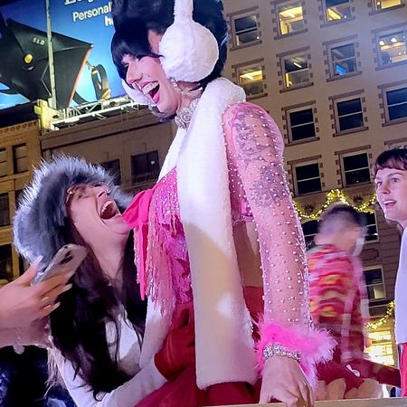 Image of: Drag queens sparkle on ice skates in Union Square